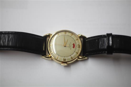 A gentlemans 1950s? 14ct gold Jaeger Le Coultre automatic wrist watch with power reserve indicator,